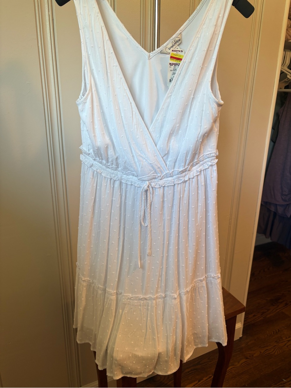 Speechless White Sleeveless Wrap Mini Dress with Tie Waist and Ruffle Hem